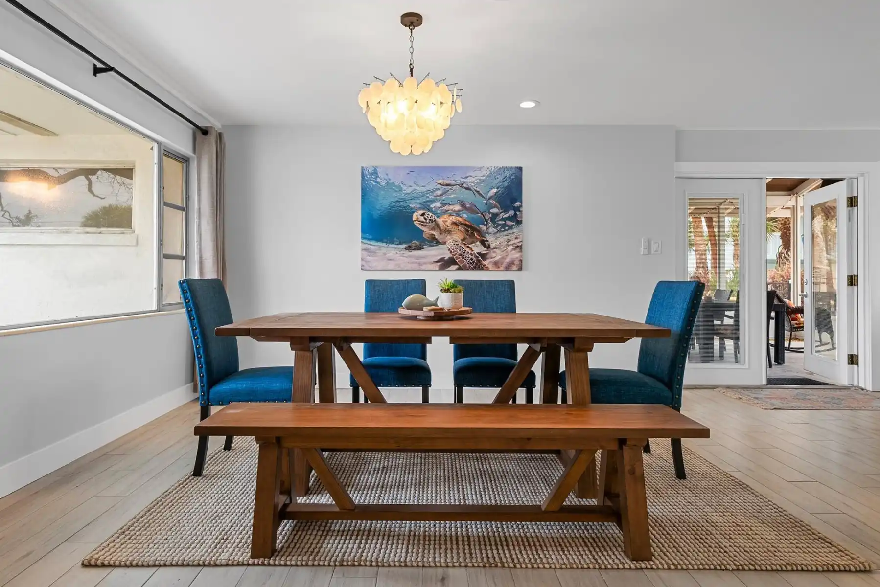 Dining table seats 6 or more, for family game night or rare days that you aren't eating on the lanai.