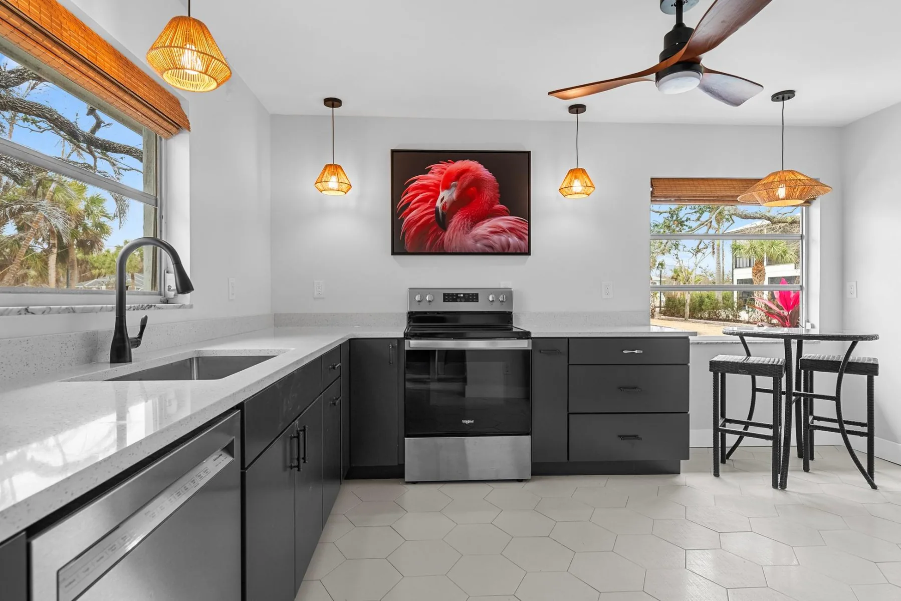 Enjoy the brand new kitchen! Fully stocked and so pretty. Plenty of countertop space and a pub table for "supervisors".