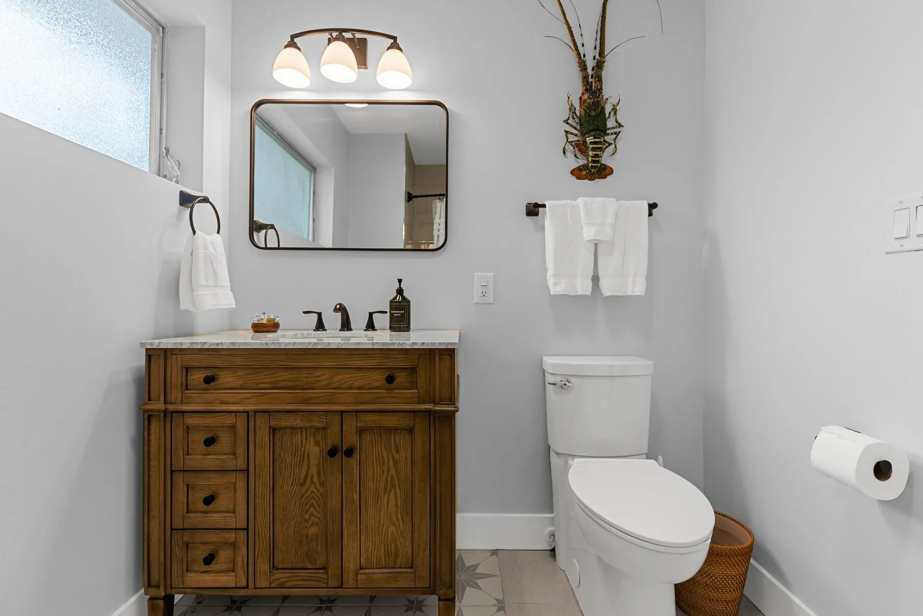 Private bathroom in primary bedroom suite, with bath tub.