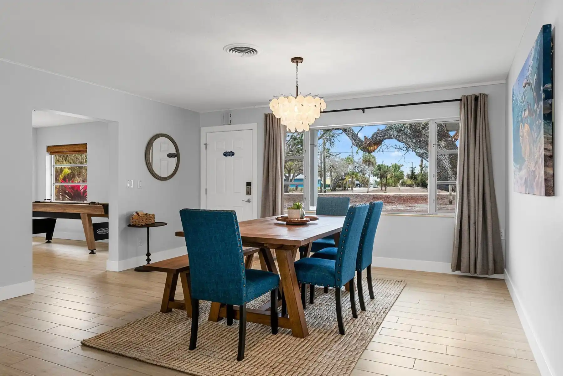 Dining table seats 6 or more, for family game night or rare days that you aren't eating on the lanai.