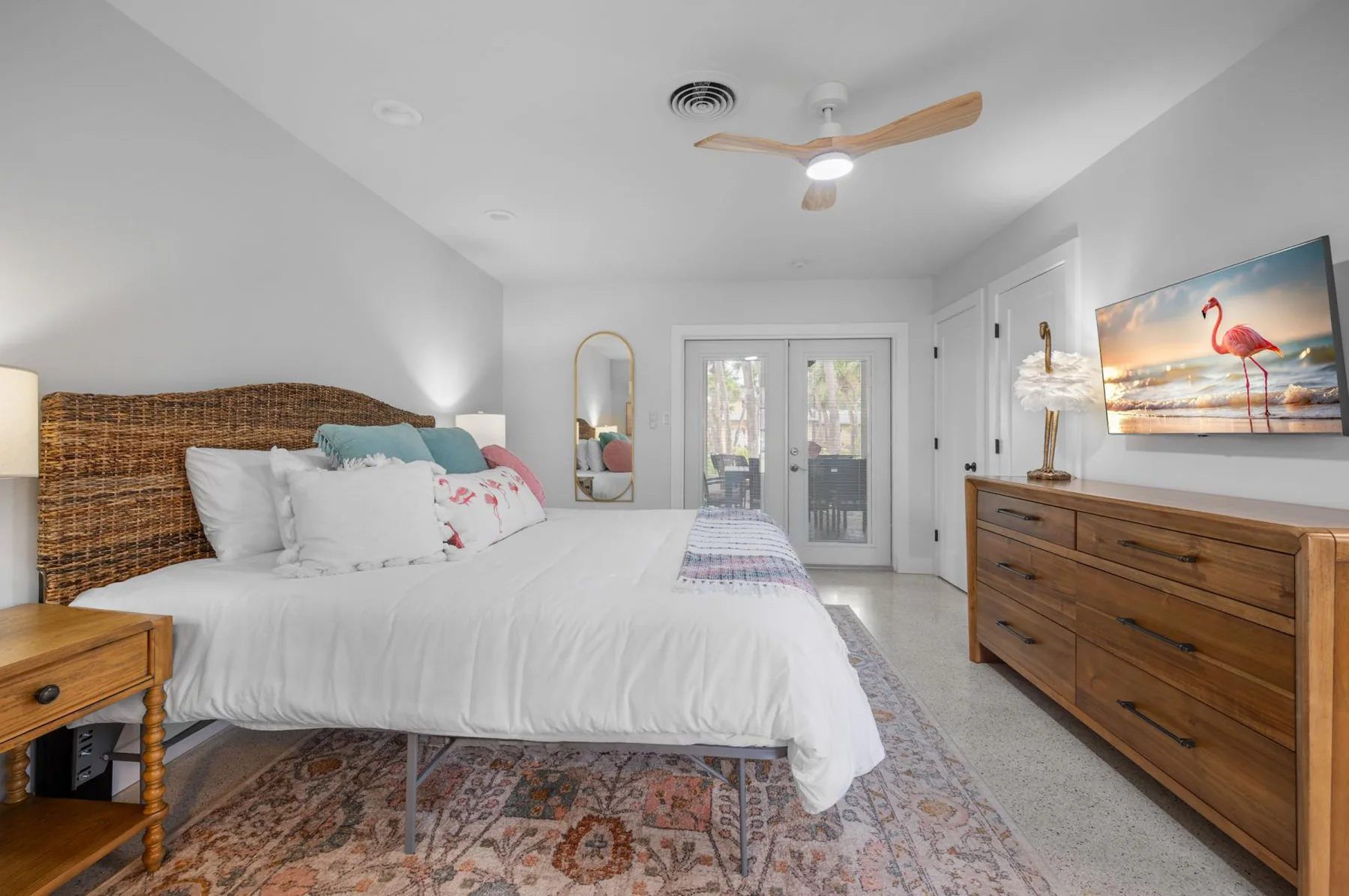 Private primary suite (with full bath) leads to the lanai, and then through to the main house.