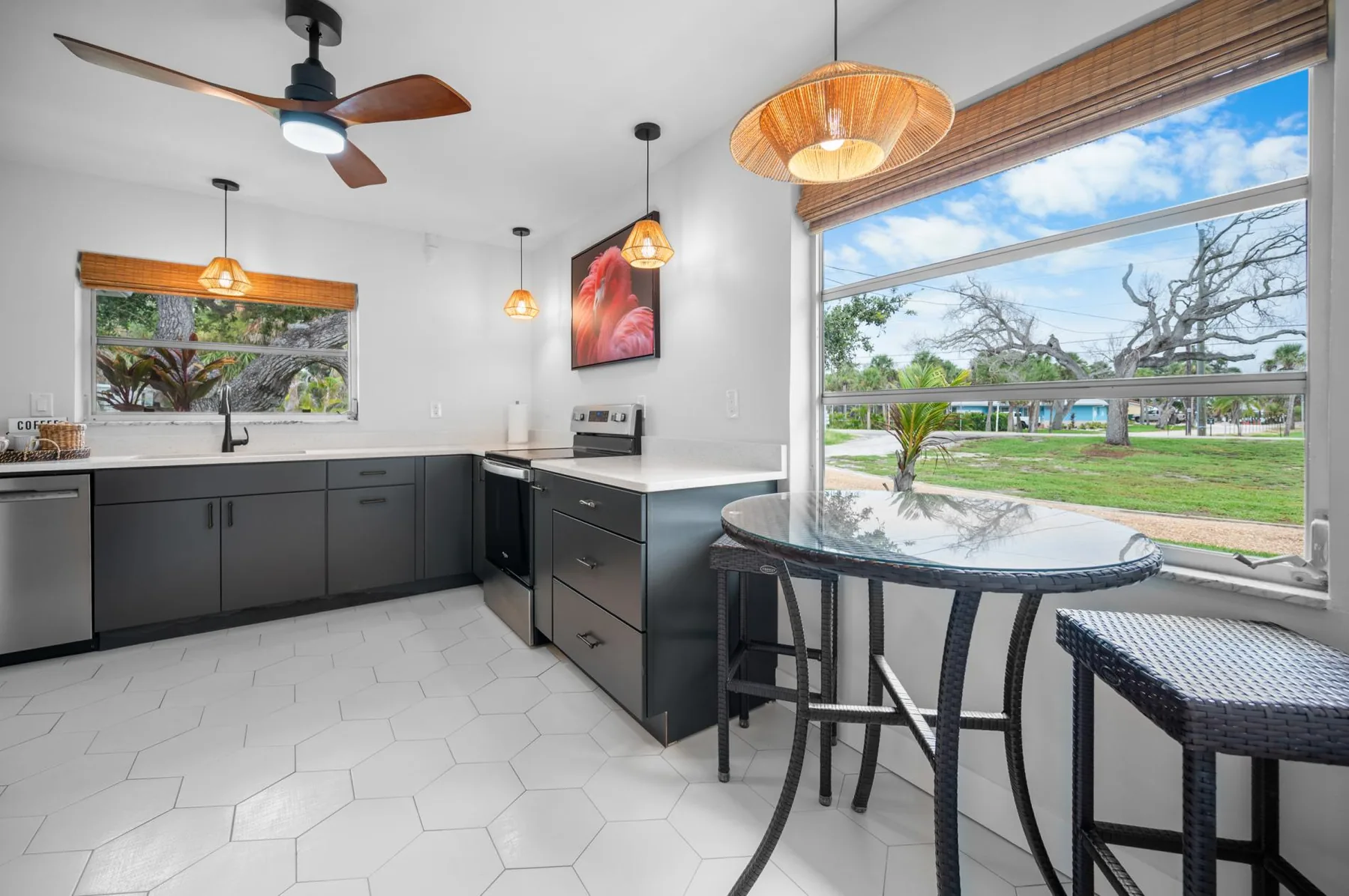 Enjoy the brand new kitchen! Fully stocked and so pretty. Plenty of countertop space and a pub table for "supervisors".