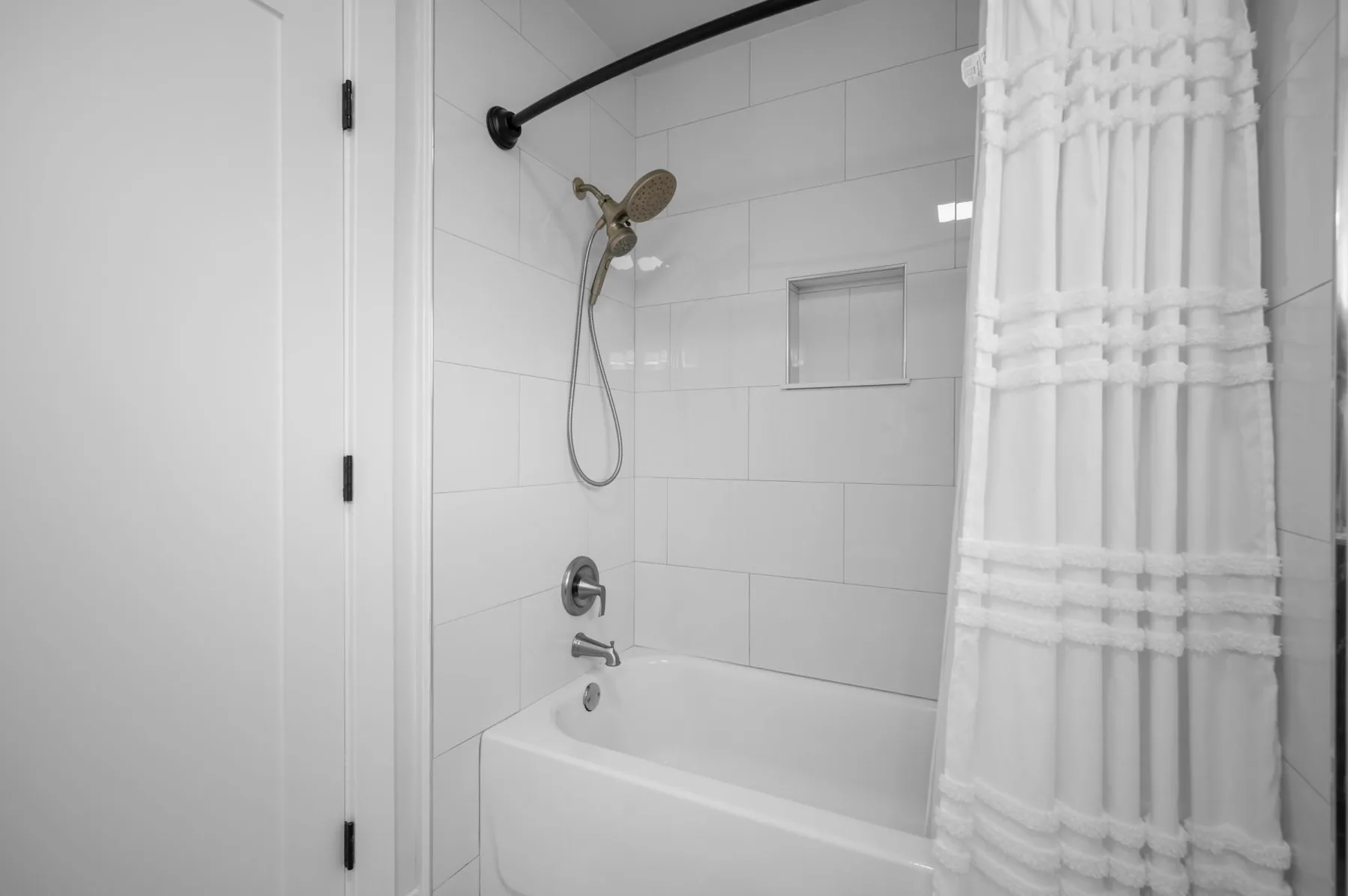 Bathtub in primary bedroom suite.
