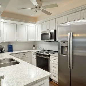 2BR Condo – Heated Pool, Lanai & Walk to Beach
