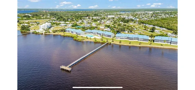 Waterfront 2BR – Pool, Dock & River Views