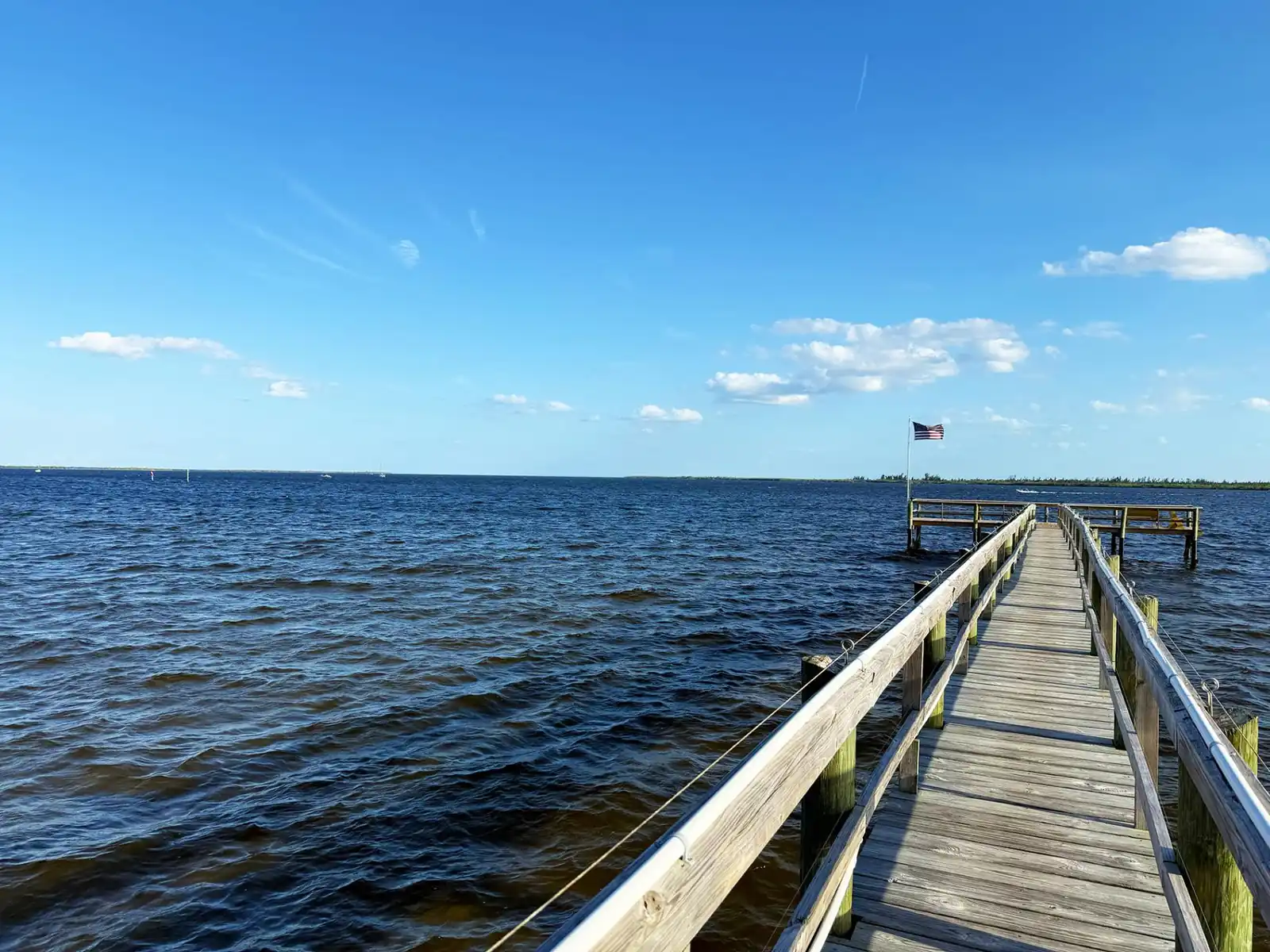 Waterfront 2BR – Pool, Dock & River Views