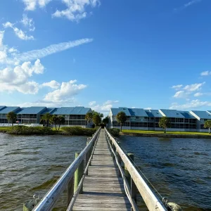 Waterfront 2BR – Pool, Dock & River Views