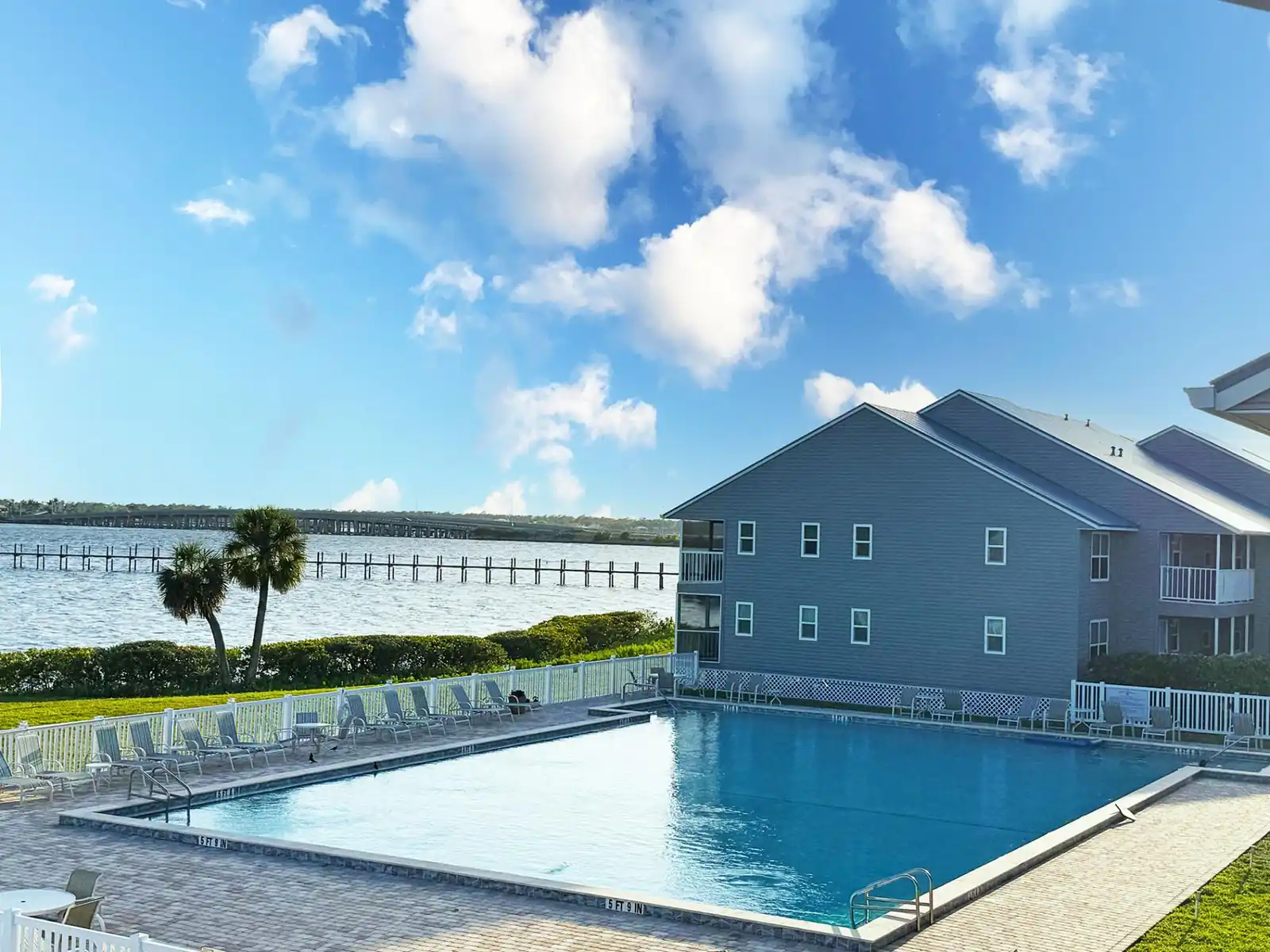 Waterfront 2BR – Pool, Dock & River Views
